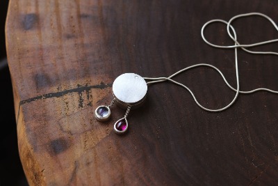 Sliding locket pendant with Gemstone